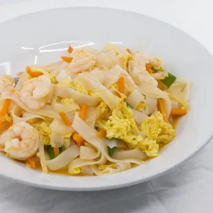 a bowl of noodles and shrimp