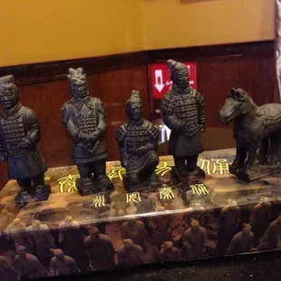 a group of figurines on a table
