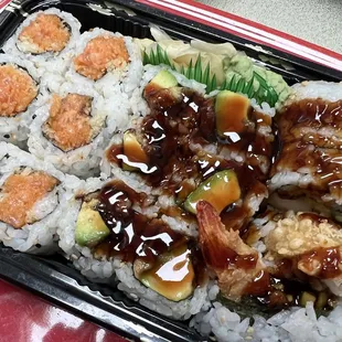 Spicy salmon, eel avocado and shrimp tempura rolls as part of another three sushi roll lunch special.