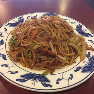 a plate of stir fried noodles