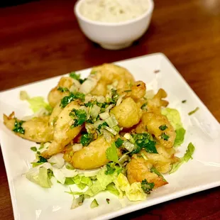 Number 83 , shrimp on a bed of lettuce