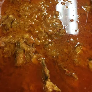 a pot of stew with meat and vegetables