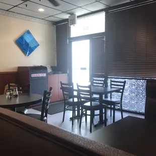 a table and chairs in a restaurant