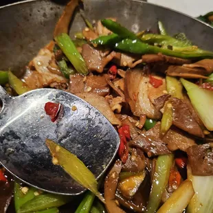 a stir fry with vegetables and meat