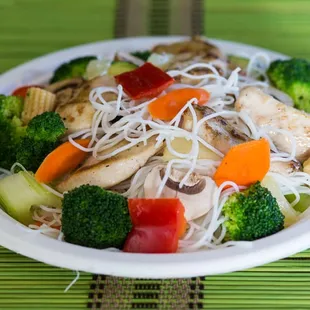 Gluten free noodles and sauce with chicken.