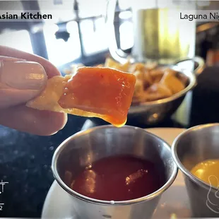 Complimentary wonton crisps served with sweet &amp; sour sauce and hot mustard.