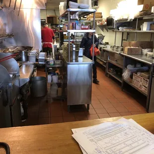 a restaurant kitchen with a lot of counter space