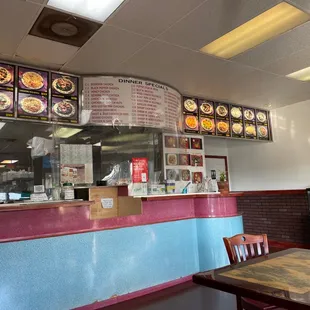 a view of a restaurant counter