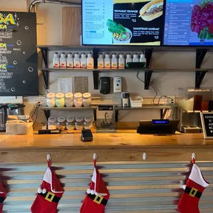 christmas stockings hanging on a bar