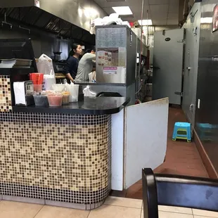 a man preparing food in a restaurant