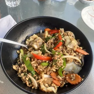 a bowl of rice and vegetables
