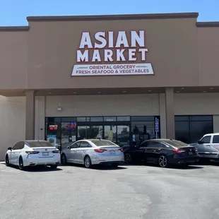 cars parked in front of the store