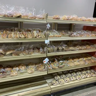 a variety of baked goods on shelves