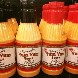 a row of yum yum sauces