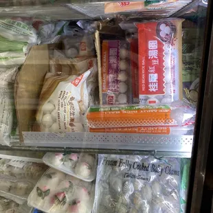 an assortment of food in a refrigerator