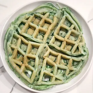 Pandan waffle, $7. Gummy &amp; inedible. It went into the garbage. It's sold by the vendor that sells garlic fried chicken &amp; shrimp balls.