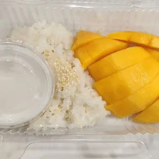 Mango sticky rice from Emberleeshop Thai Food. $8. They sold papaya salad too. Thai &amp; Lao style. Hubby got the Lao, and he said it was good.