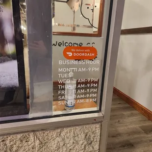 Hours on the front door