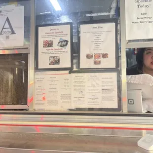 The oh so pleasant person who scolded me for wanting to to take a photo of her menu without parking my car.