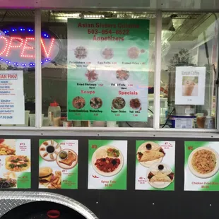 a food truck with menus