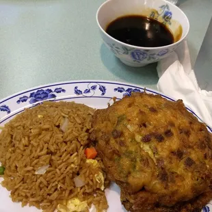 a plate of food and a cup of coffee