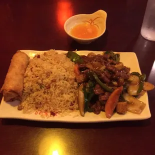 a plate of food with rice and vegetables