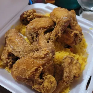 Pork fried rice with chicken wings. Very good but rice could've used more onion, egg n pork