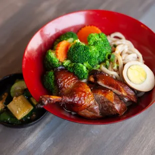 Duck leg noodle bowl