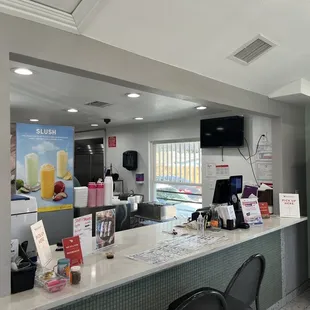 a view of a restaurant counter