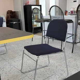 a table and chairs in a restaurant