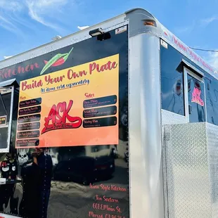 a food truck parked in a parking lot