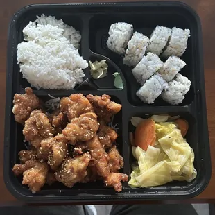 sesame chicken bento box with gyoza (gyoza not in picture)