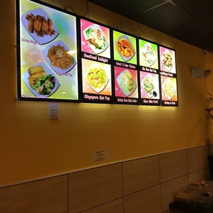 menus on a wall in a restaurant