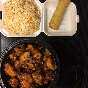 General Tso&apos;s Chicken with fried rice and a spring roll