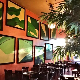 Dining area with wall art.