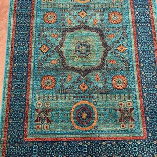 Show stopping Turquoise rug with Egyptian design