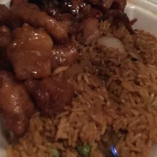 Half orange chicken, half bourbon chicken. Juice on the fried rice.