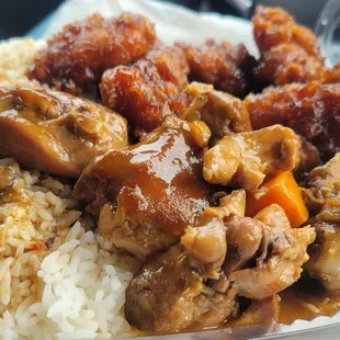 Steamed rice, Spicy chicken, Sesame chicken  The portion is huge.  They are super generous.   The size is good for sharing.