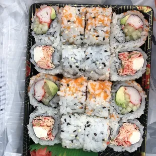 a tray of sushi rolls