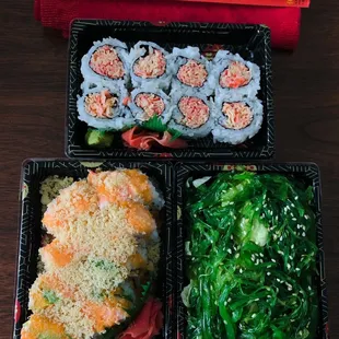 three trays of food on a table