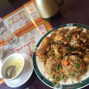 Best lunch combo! Wild basil chicken with spring roll, egg flower soup and tea :) spice level 4! Awesome