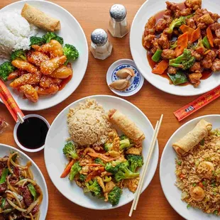 four plates of food on a table