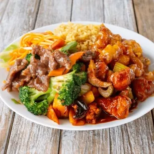 beef, broccoli, and rice on a white plate