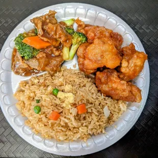 a plate of food with rice and vegetables