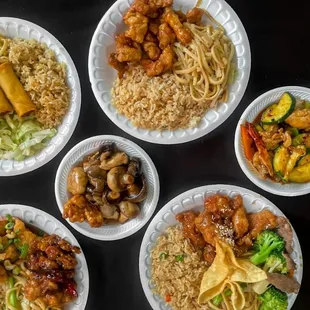 four plates of food on a table