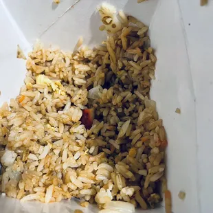 rice and vegetables in a white container