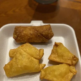 Crab Rangoon and an egg roll included in out combo meal.