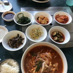Seafood tofu soup at top and spicy beef soup on bottom