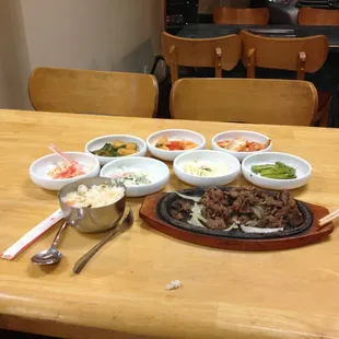 This is the #4 Bul go gi. Marinated beef. Extremely good. There's really enough for two. I'd eaten some when I took this.