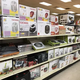 a variety of appliances on shelves